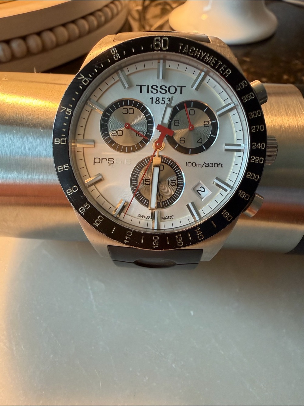 Men’s Tissot PRS 516 Quartz
Chronograph Watch featuring a silver dial